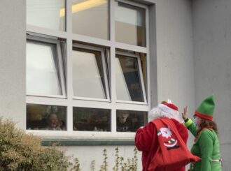 Santa and his Elf pay a visit