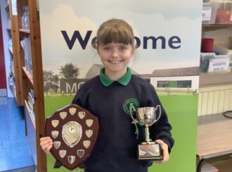 Irish Dancing Success.  We got to see the trophy in school.