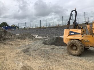 Retaining wall, main road.