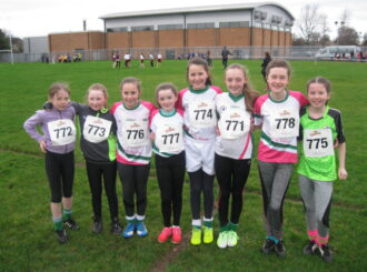 The Victorious Girls' Cross Country Team